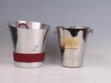 two buckets that are sitting next to each other on a table