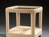 an image of a wicker side table with a shelf underneath it
