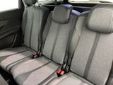 four seats in the back of a car that are empty