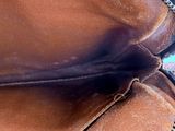 a close up of a purse with a zipper on it