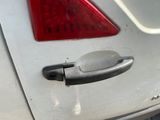 a close up of a door handle on a car