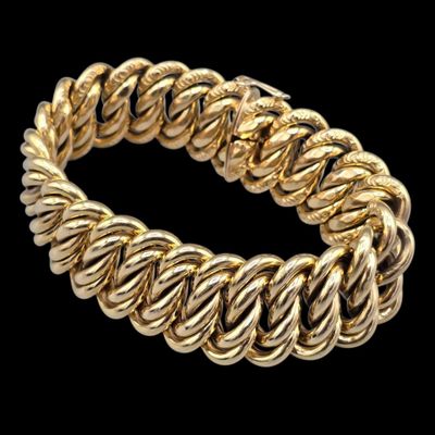 Bracelet à mailles américaines en or jaune 750°°.