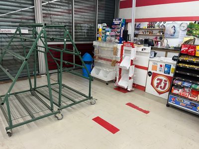 a large metal rack in the middle of a store