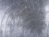 a large metal plate with a circular design on it