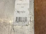 a piece of metal that has a barcode on it