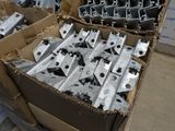 a box full of metal parts sitting on a table