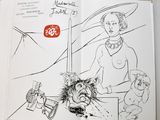 an open book with a drawing of a woman holding a knife