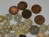 a lot of coins that are on the table