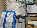 many rolls of toilet paper in a cardboard box