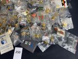 a pile of christmas ornaments on a table with a price tag