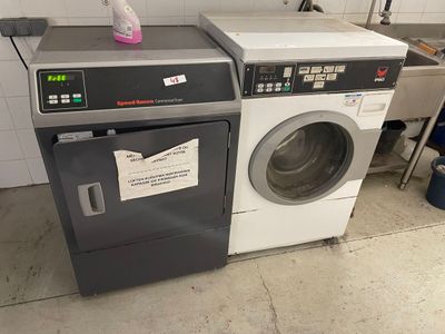 an image of a washing machine in a kitchen