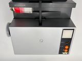 a machine that is sitting on top of a box