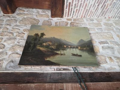 une photo d'un tableau posé par terre dans une maison