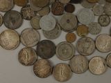 a lot of coins that are on the table