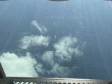 a view of the sky from the inside of an airplane