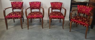 Suite de quatre fauteuils Bridge en bois naturel. XXe siècle…