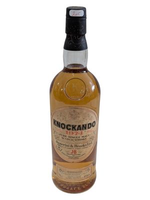 an image of a bottle of whisky on a white background