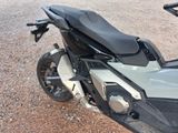 a motorcycle that is parked on the side of the road