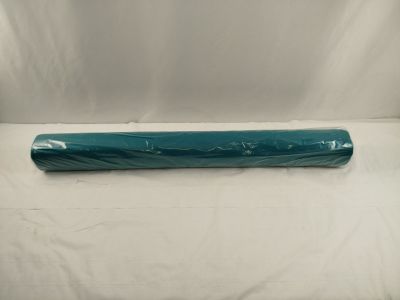 a close up of a roll of blue plastic on a white background