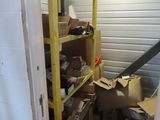 a room with a lot of boxes and boxes on the shelves