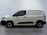 a white van that is parked in a room