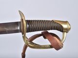 an old sword with a gold handle on a white background