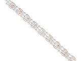 a close up of a diamond bracelet on a white background