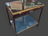 a glass table with a mirror on top of it