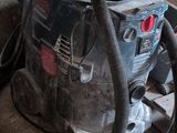 a vacuum that is sitting on the floor in the room