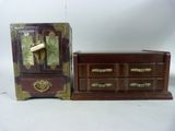 two small wooden boxes with brass handles and handles on them