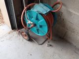 a hose that is attached to the side of a building