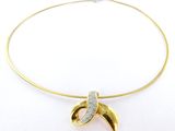 yellow gold plated necklace with a diamond pendant on a white background