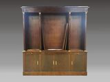 a large wooden bookcase with two doors and two drawers