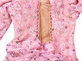 an image of a pink dress with sequins on it