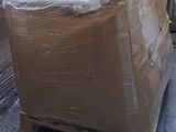 a pallet full of boxes on a pallet in a warehouse