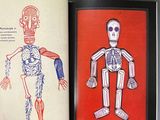 a book with a picture of a skeleton and a picture of a skeleton