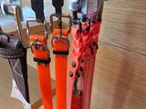 four umbrellas that are attached to a rack