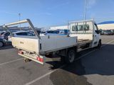 a white truck that is parked in a parking lot