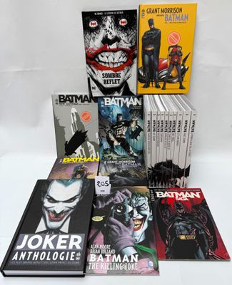 a lot of comic books that are on the table