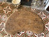 a wooden board on the floor of a room