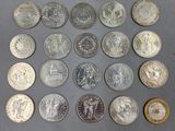 a lot of coins that are on the table