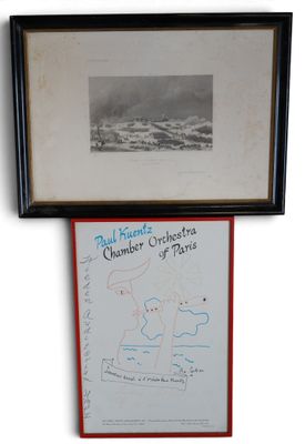two framed photographs of a map and a picture of a polar bear