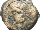 an ancient coin with a woman ' s face on it