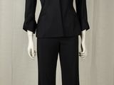 an image of a mannequin wearing a black suit