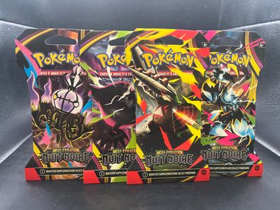 deux paquets de cartes à collectionner Pokémon