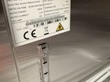 a sign on the side of a refrigerator that says commercial refrigeration
