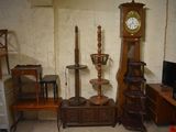 a room with a lot of furniture and a clock on the wall