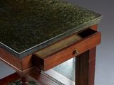 a close up of a table with a marble top