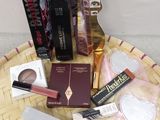 a wicker tray with various beauty products on it