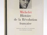 the front cover of a book with a picture of a man in a suit